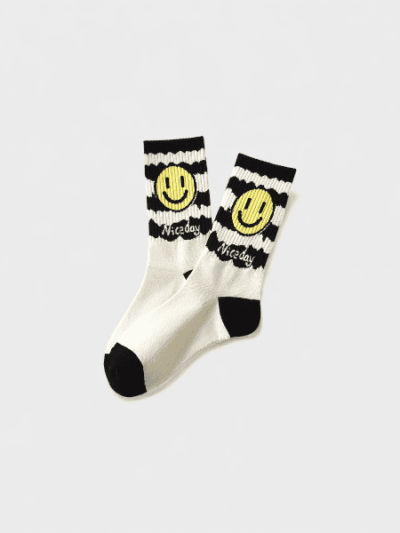 2023 new black and white smiley face men's socks mid-calf length socks autumn and winter high waist women's socks couple sports stockings cross-border
